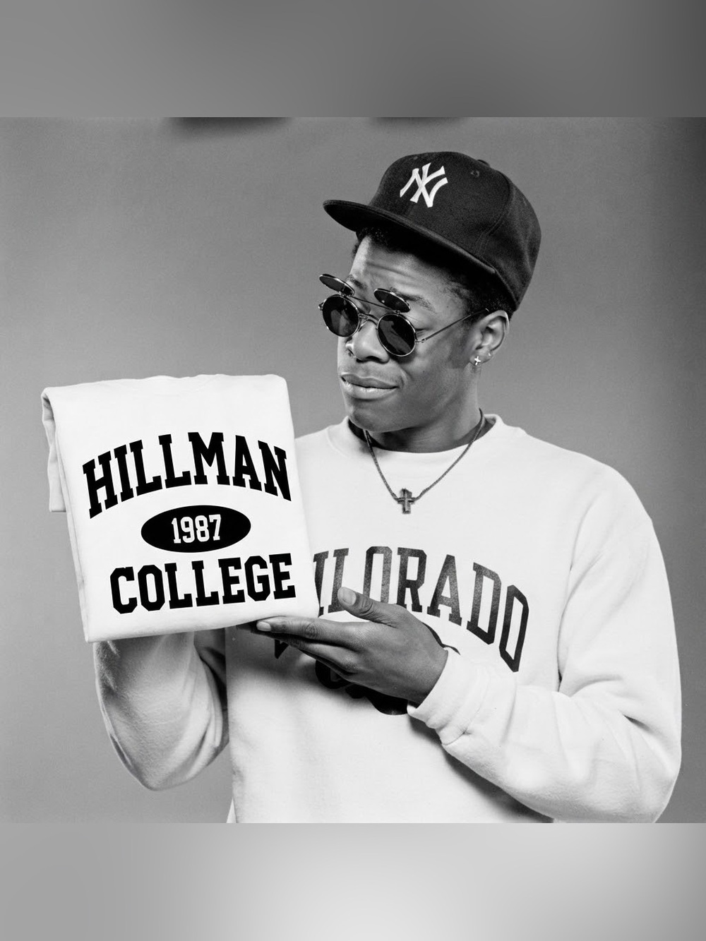 Vintage 90s Sitcom Hillman College 1987 Retro Varsity Graphic Tee White